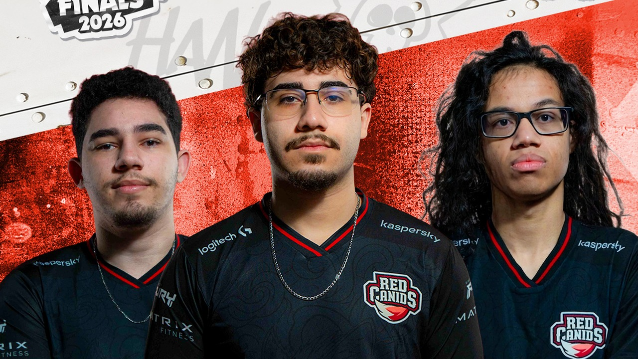 The three RED Canids players pose in their team jerseys